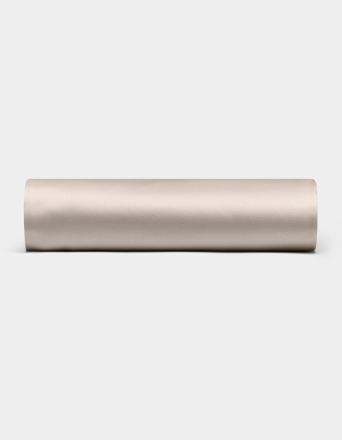 A Cozy Earth Bamboo Fitted Sheet in plain, light beige is shown lying horizontally on a white background, viewed from the side.|Color:Driftwood