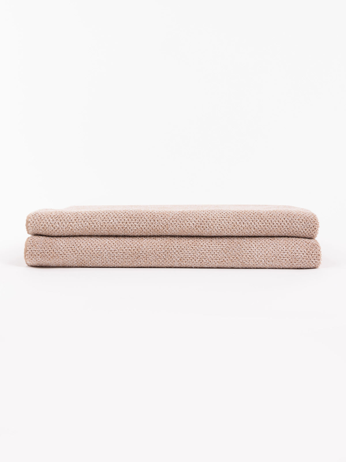 A pair of folded Nantucket Bath Sheets 
