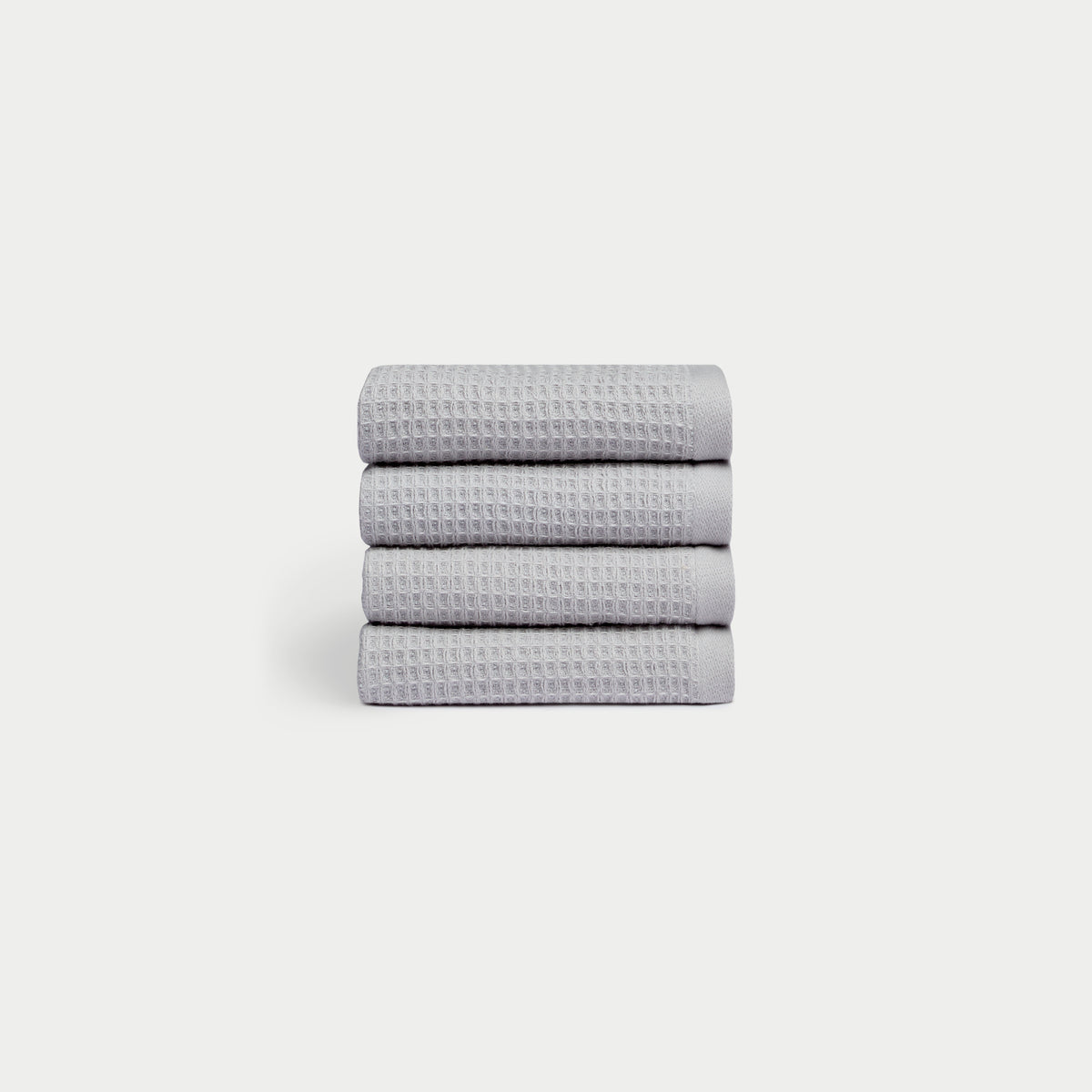 Harbor Mist Waffle Cloths neatly folded. The photo was taken with a white background. 