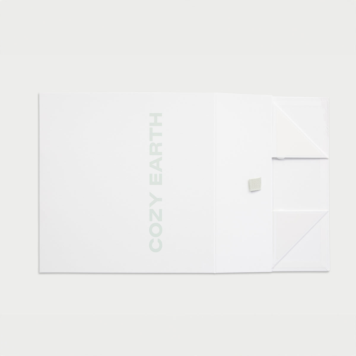 Flattened but closed gift box 