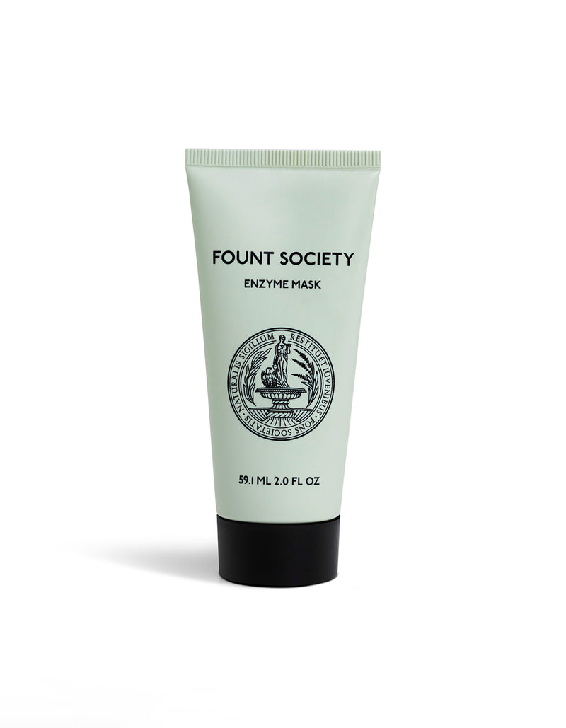 A light green tube labeled "Cozy Earth Enzyme Mask" with a black cap, displaying a circular emblem and text showing 59.1 ml (2.0 fl oz), set on a white background.