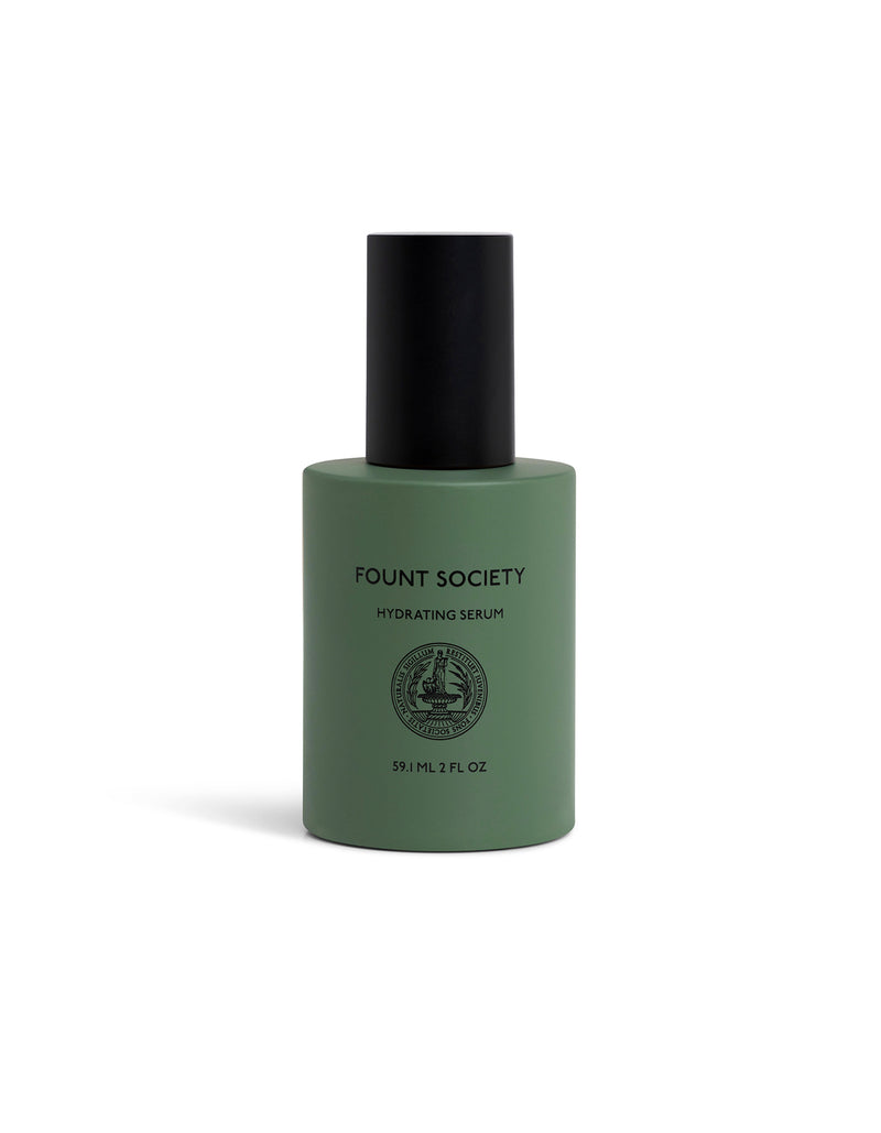 Green serum bottle with black cap on a white background, featuring 'Fount Society' branding.