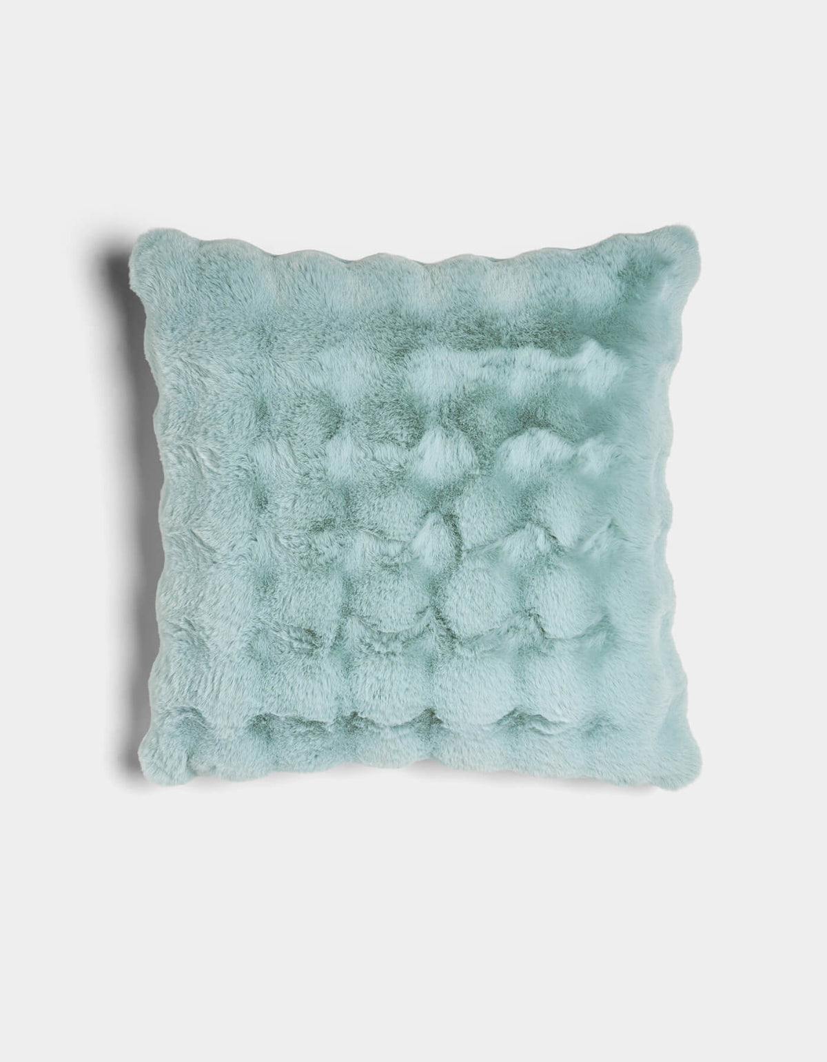 The Cozy Earth Bubble Cuddle Pillow is a square, light blue plush pillow with a soft, fuzzy texture and gently wavy edges, displayed against a plain white background.
