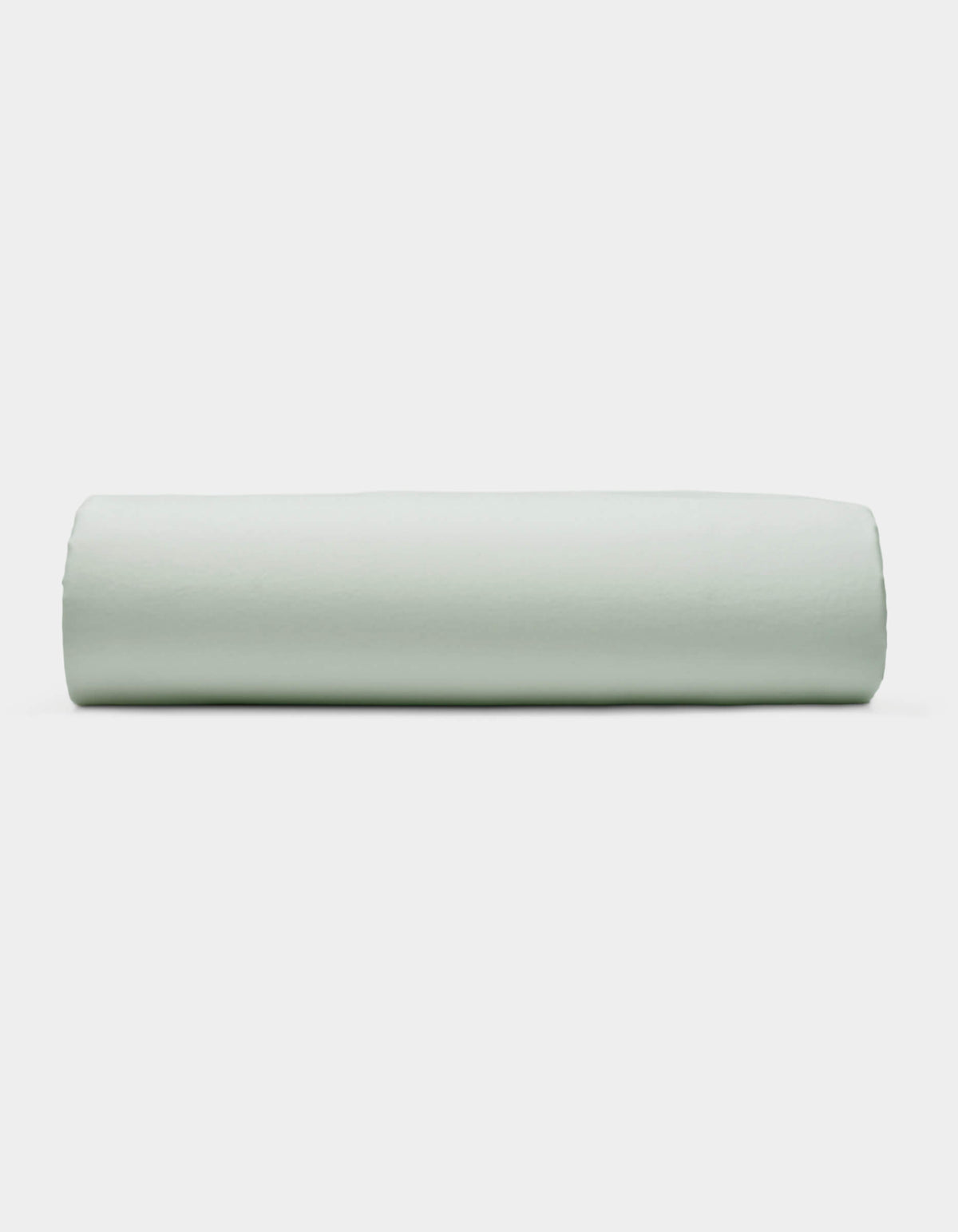 A Soft-Wash Cotton Fitted Sheet by Cozy Earth is displayed neatly folded against a plain white background.|Color:Laurel