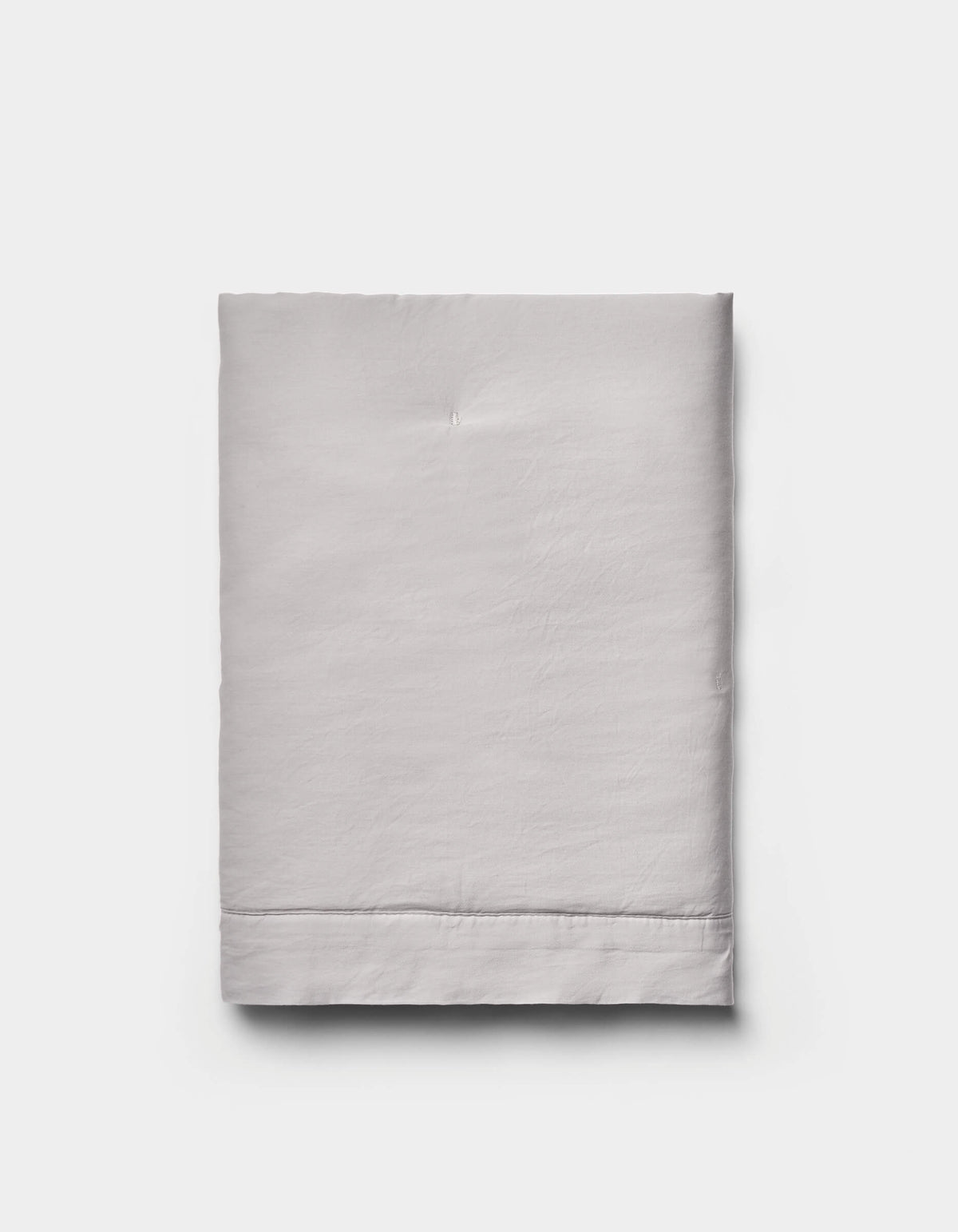 The Cozy Earth Soft-Wash Cotton Quilted Shams are shown neatly folded in light gray against a plain white background.