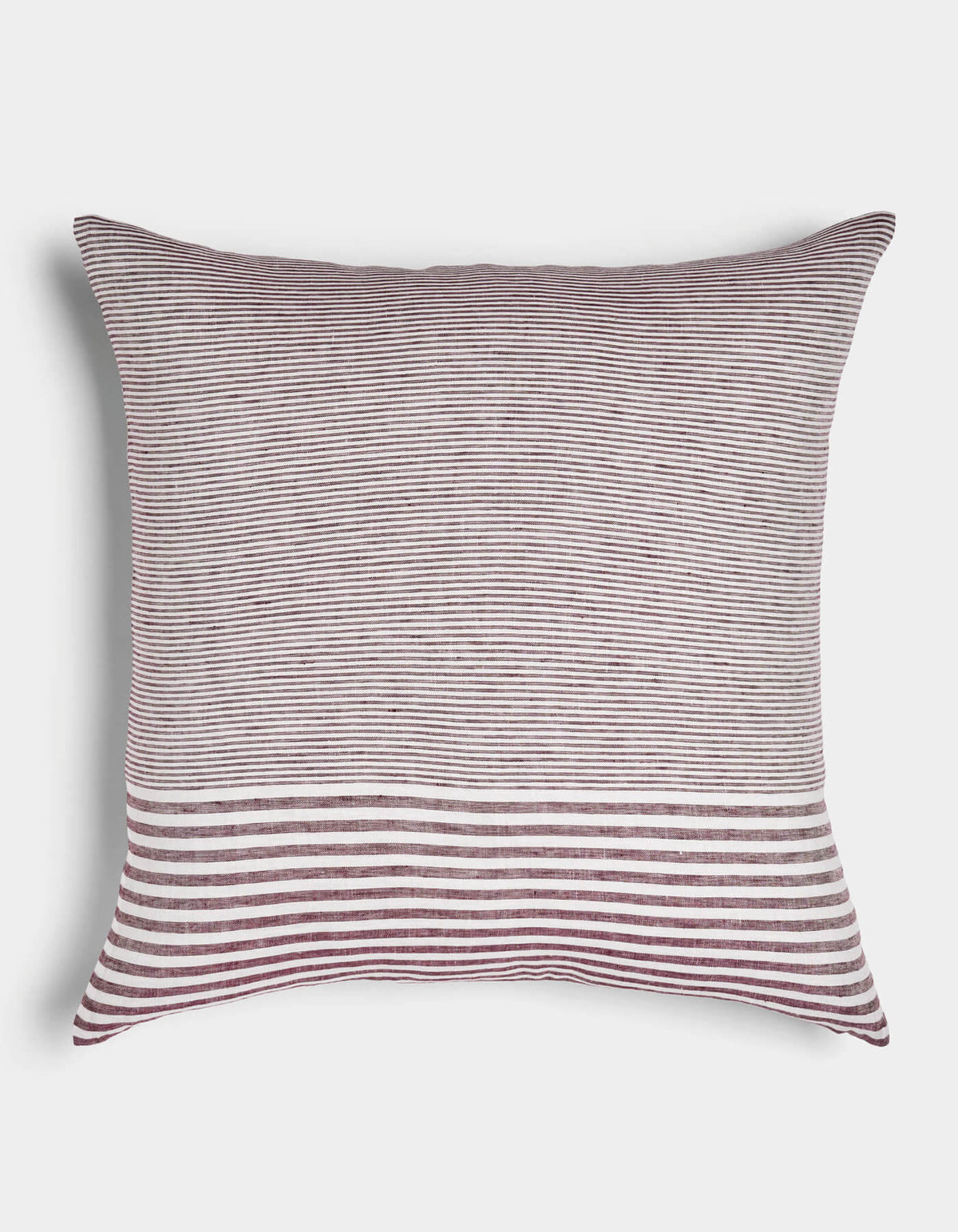 The Cozy Earth Striped Throw Pillow features thin burgundy and white horizontal stripes with a bold band of wider stripes at the bottom, displayed on a white background.