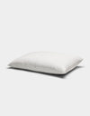 The Baja Double Sided Sham by Cozy Earth is a white, rectangular pillow with subtle horizontal stitching, displayed against a plain light gray background.|Color:Laurel Stripe/Striped Bone