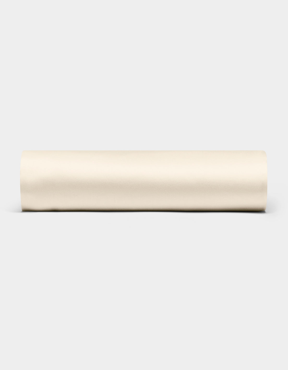 A Bamboo Fitted Sheet by Cozy Earth is displayed horizontally against a plain light gray background.