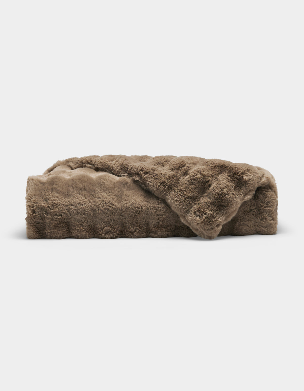 The Bubble Cuddle Blanket by Cozy Earth, made of soft brown faux fur, is folded neatly against a plain white background.|Color:Walnut