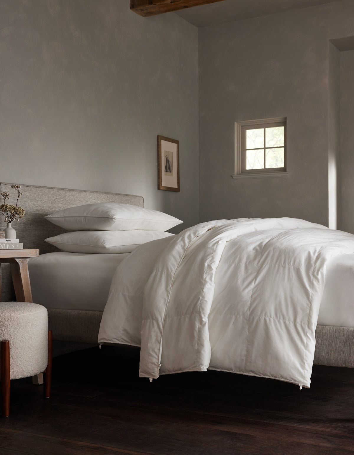 Down alternative comforter to be paired with Dove Grey, Charcoal, Creme, Driftwood, Light Grey, Oat, Pacific Blue, Shore, Peony, Walnut, Laurel, Classic Stripe in Pacific, Classic Stripe in Ebony, Classic Stripe in Laurel, White duvet cover.