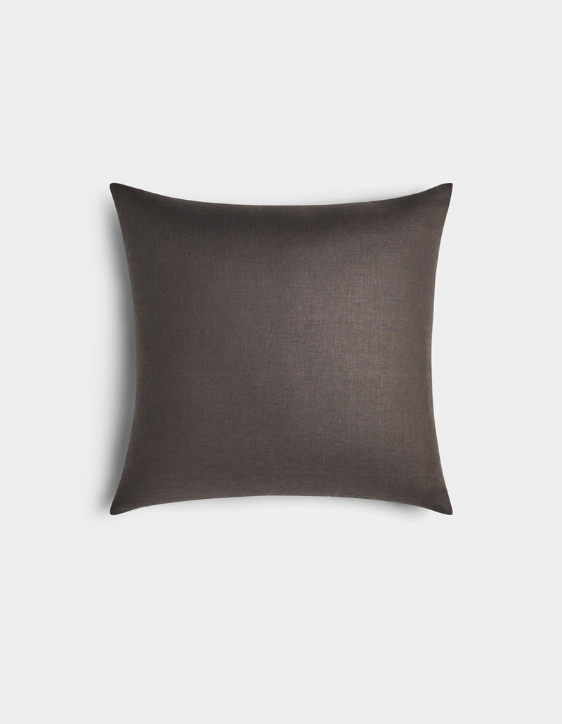 The Cozy Earth Linen Throw Pillow is rectangular, dark gray, and features a smooth fabric texture, shown against a plain white background.
