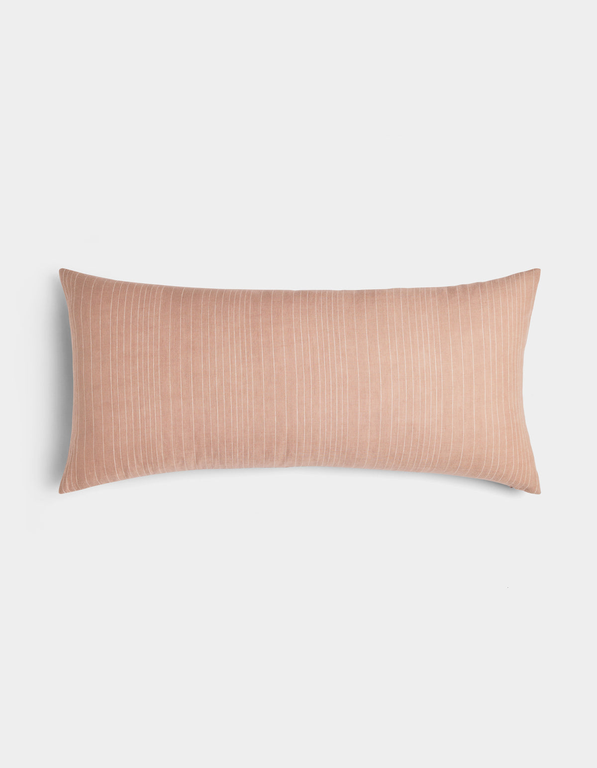 The Cozy Earth Striped Throw Pillow features a rectangular, blush pink design with subtle vertical white pinstripes, shown on a plain white background.