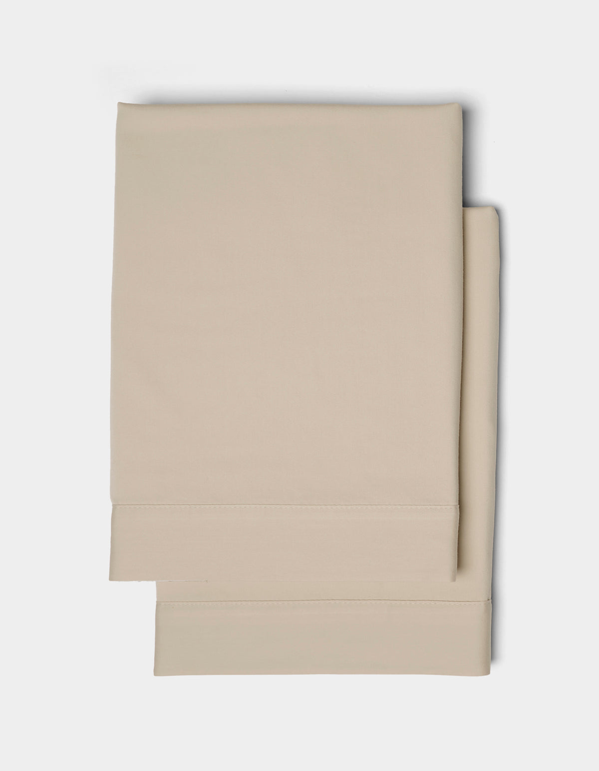 Two neatly folded Cozy Earth Soft-Wash Cotton Shams with stitched hems, displayed on a plain white background.
