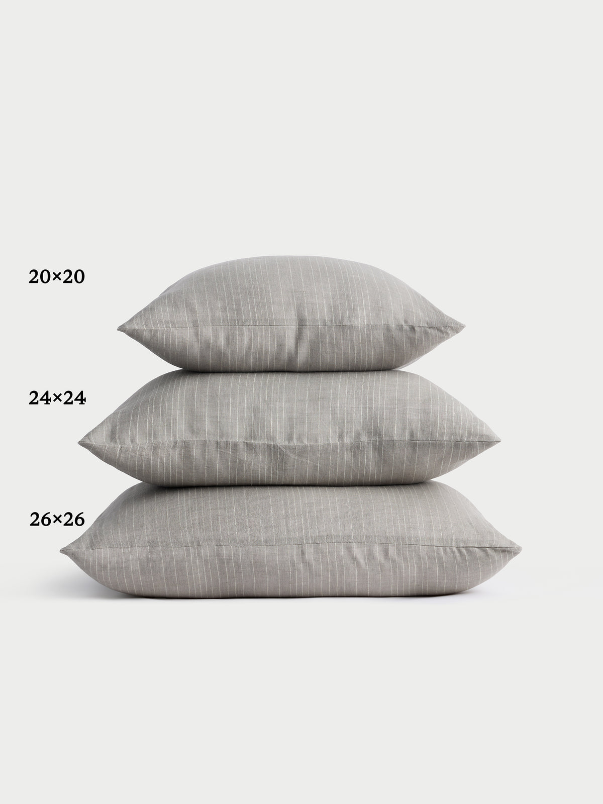 Cozy Earth striped throw pillow with plain white background 