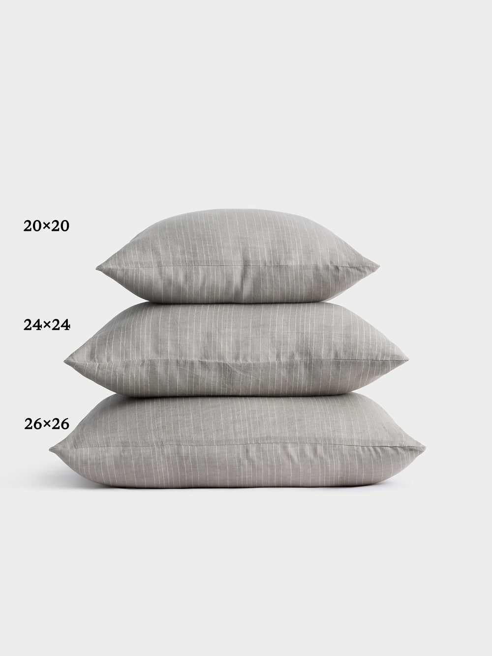Cozy Earth striped throw pillow with plain white background 
