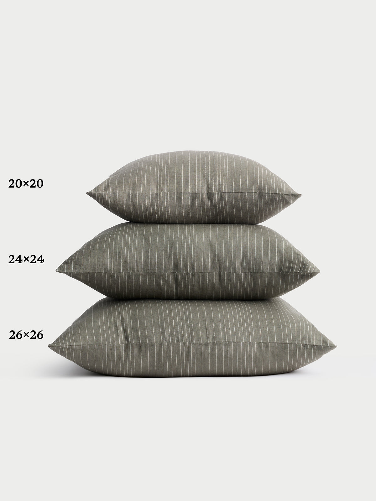 Cozy Earth striped throw pillow with plain white background 