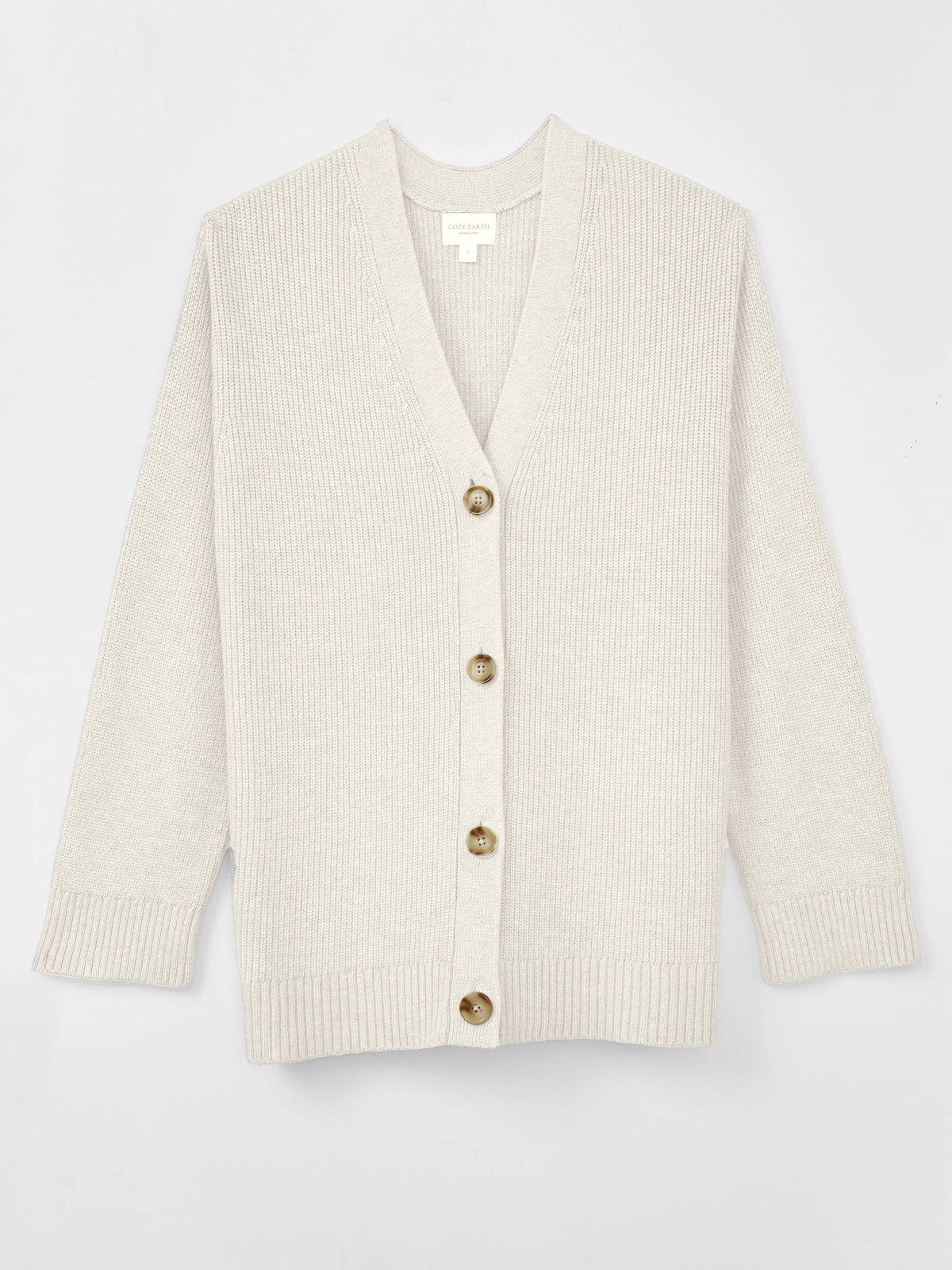 A woman wearing Cozy Earth Classic Cardigan is pictured on a white background 