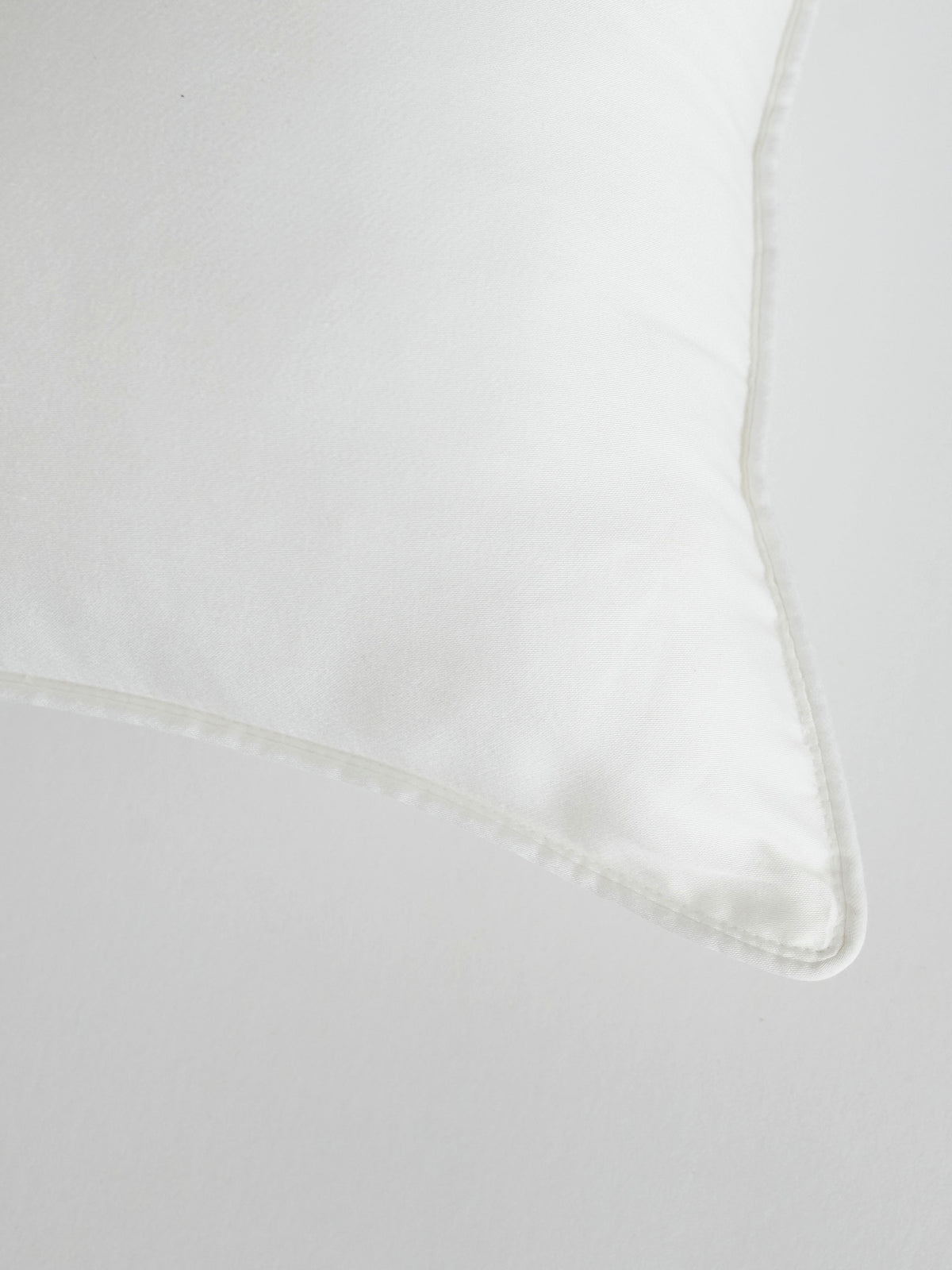 Travel pillow corner with white background 