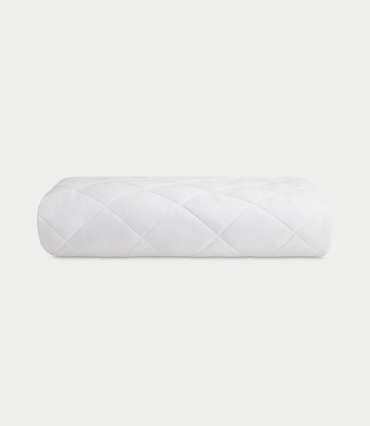 Mattress pad folded with white background