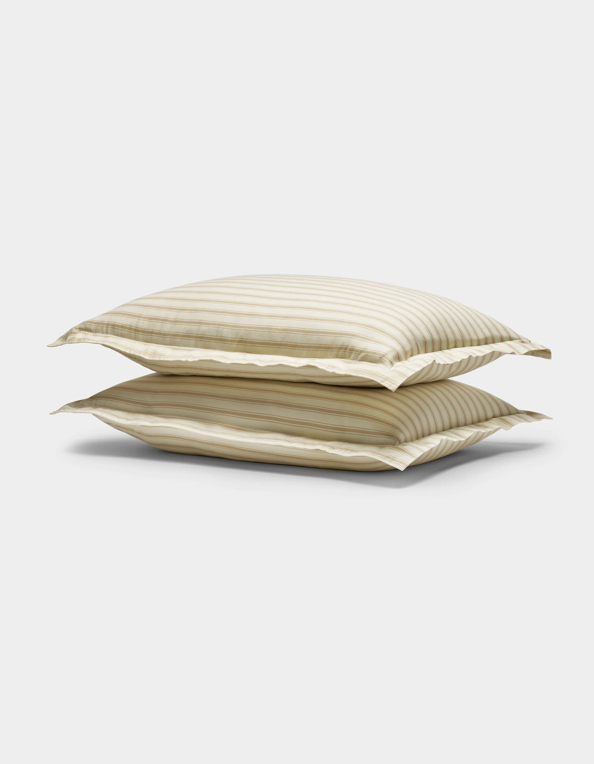 Two stacked Soft-Wash Cotton Shams by Cozy Earth, featuring beige and white stripes with a subtle sheen, displayed against a plain white background.|Color:Coconut and Sandalwood Stripe