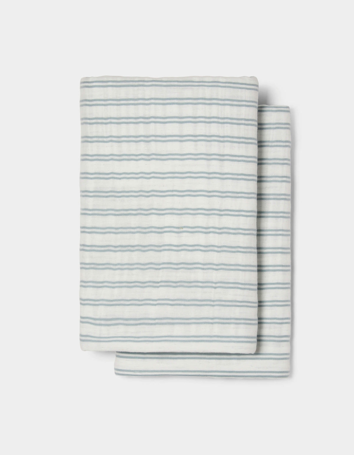 The Cozy Earth Waterfront Shams feature a neatly folded white design with thin, evenly spaced horizontal blue stripes, set against a plain white background.
