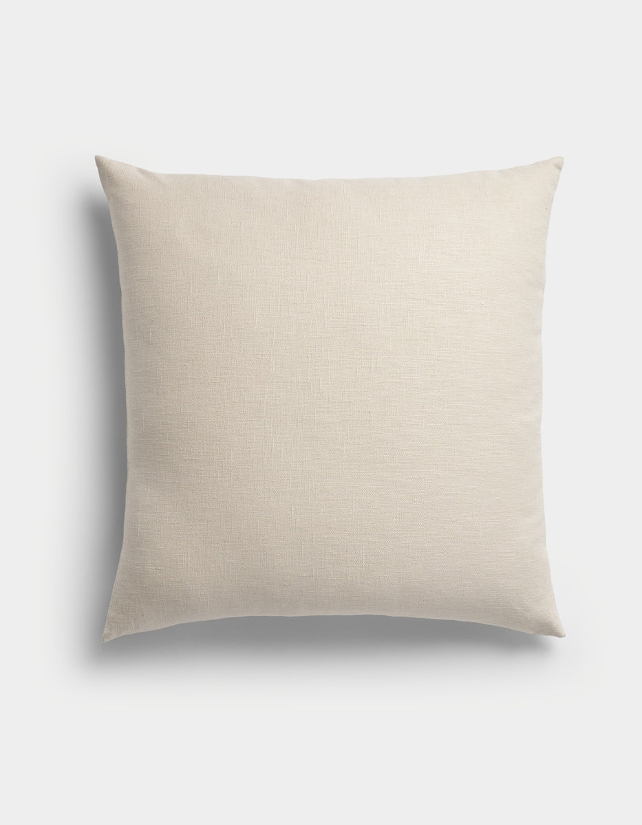 The Cozy Earth Sonoma Throw Pillow, featuring a square shape and beige textured fabric cover, is displayed against a plain white background with a soft shadow on the left side.|Color:Canvas|Size:26" x 26"