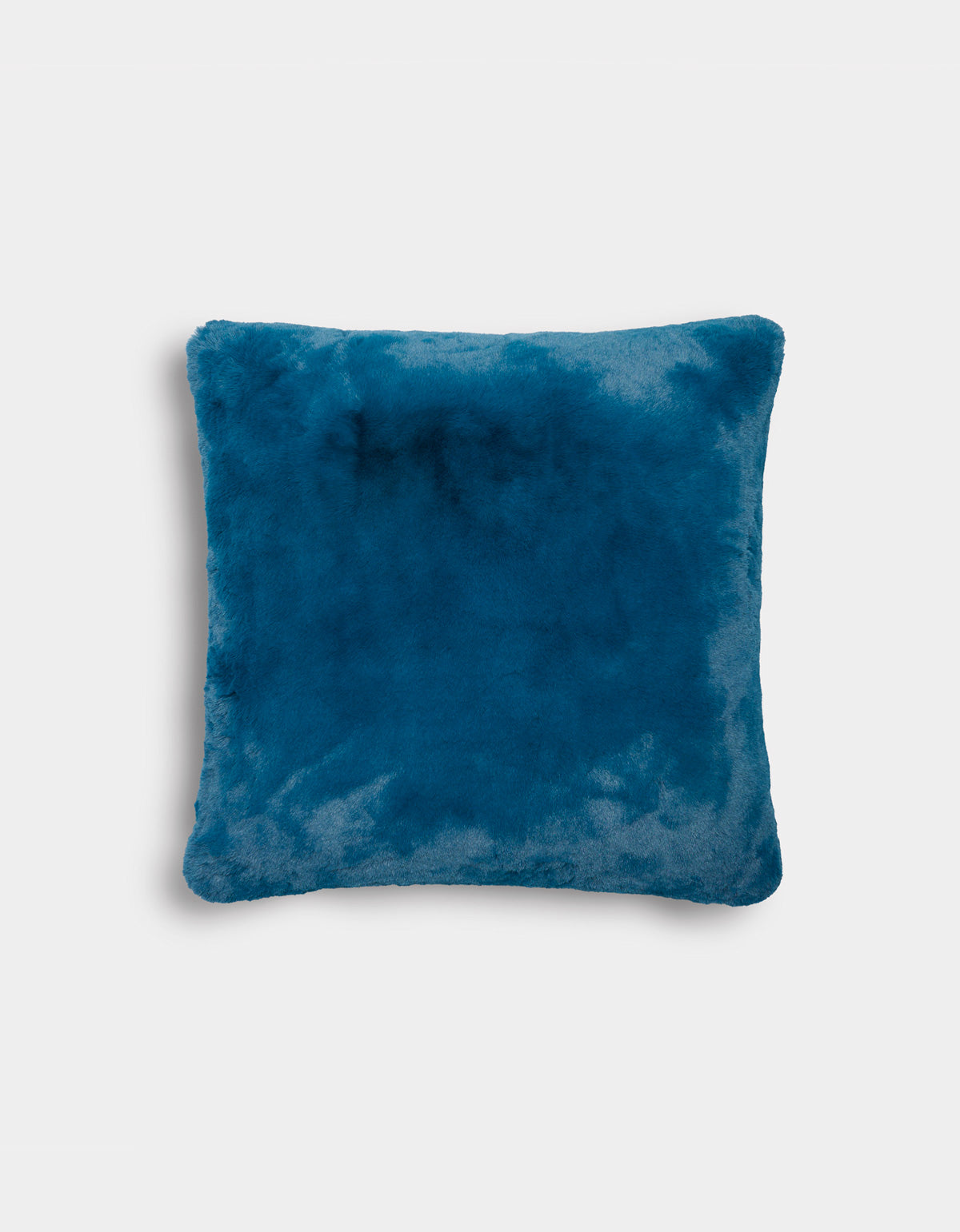 The Superplush Cuddle Pillow by Cozy Earth, featuring a square shape and soft, plush blue texture, is displayed against a plain white background.|Color:Deep Water |Size:24" x 24"