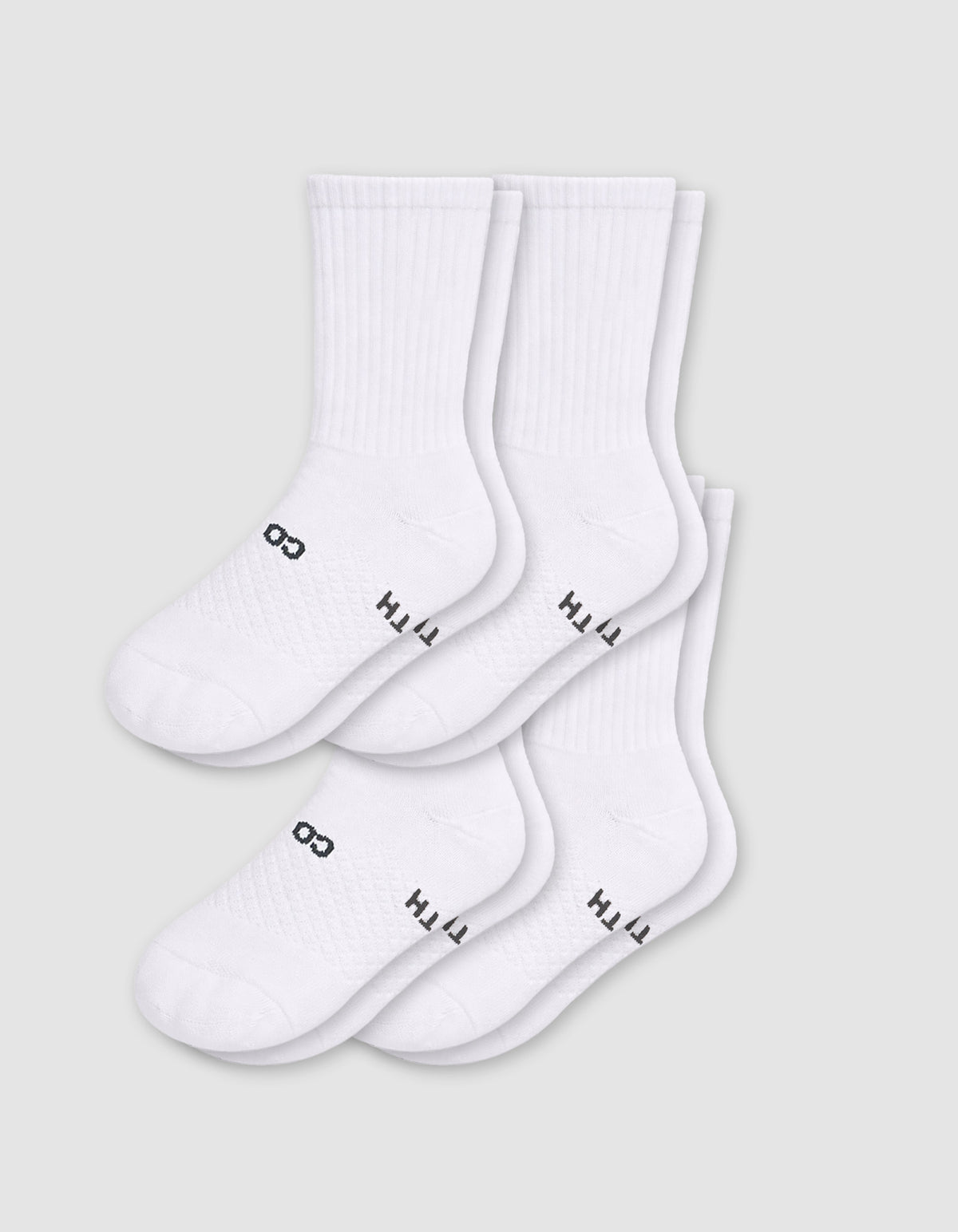 Cozy Earth Men's Essential Calf Sock 4-Pack in white, featuring black text near the toes, displayed on a light gray background.|Color:White
