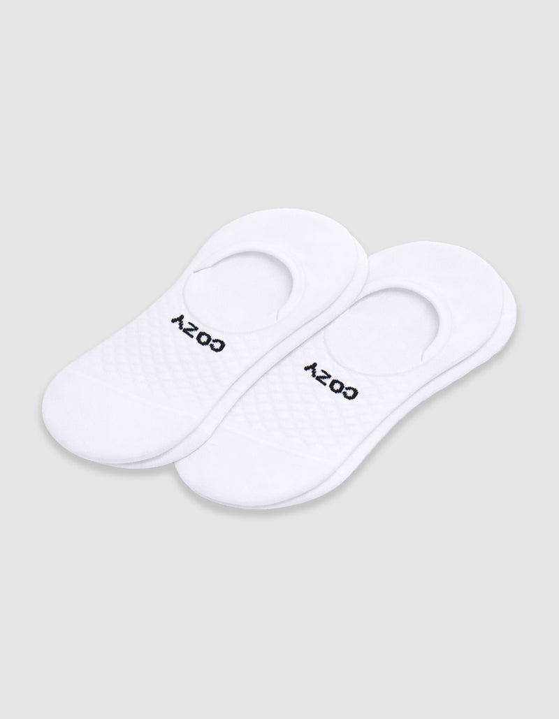Women's Essential No-Show Sock by Cozy Earth: white socks with a quilted pattern and "COZY" in black near the opening, shown on a plain white background.