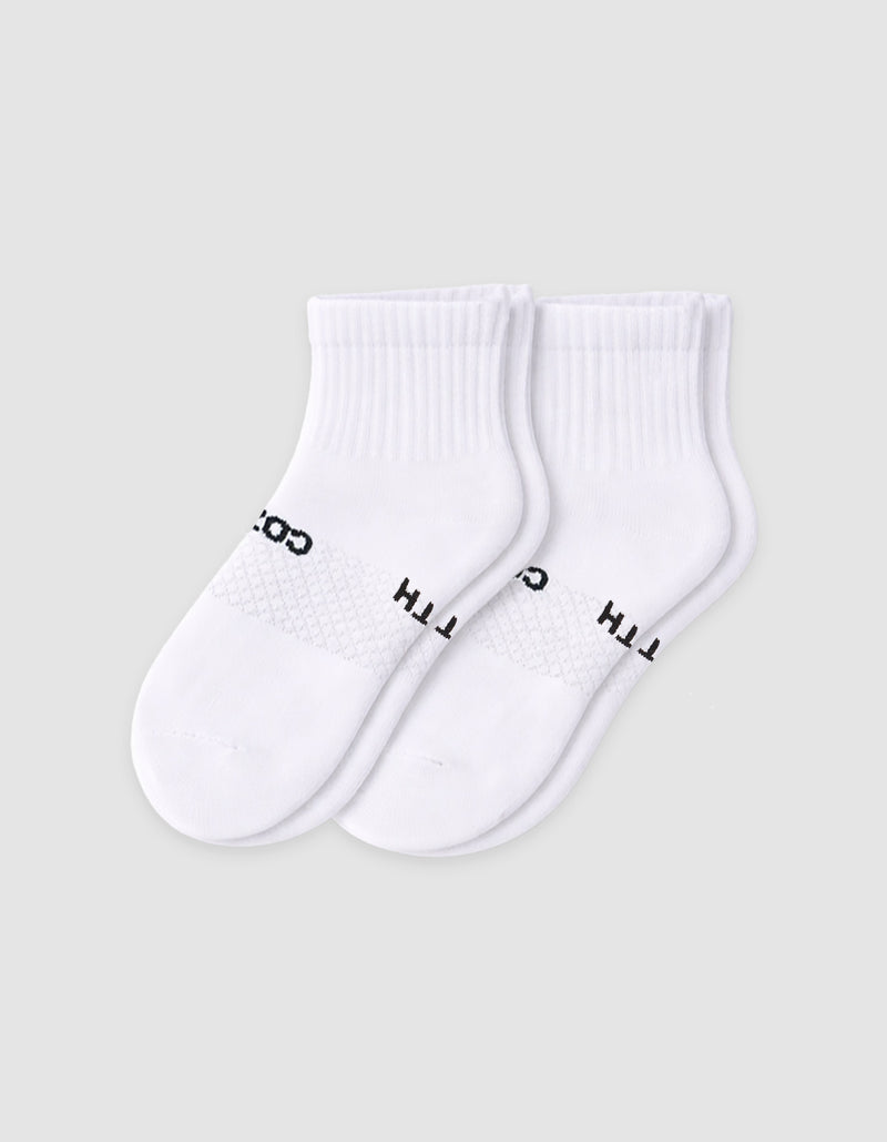 The Cozy Earth Men's Essential Quarter Sock features white ribbed cuffs and a discreet black text design on the sides, displayed against a plain light background.