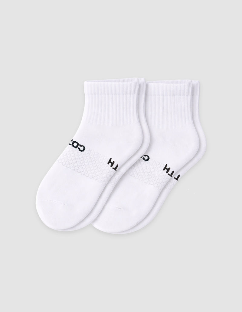 The Cozy Earth Men's Essential Quarter Sock features white ribbed cuffs and a discreet black text design on the sides, displayed against a plain light background.