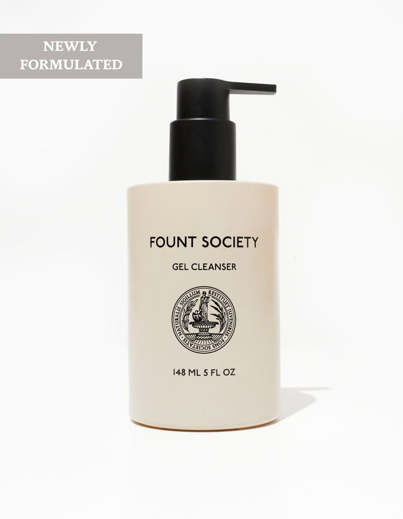 A 148 mL (5 fl oz) bottle of Cozy Earth Gel Cleanser includes a black pump dispenser and the brand's logo on the label. A "Newly Formulated" banner is displayed in the top left corner, and it is set against a plain white background.