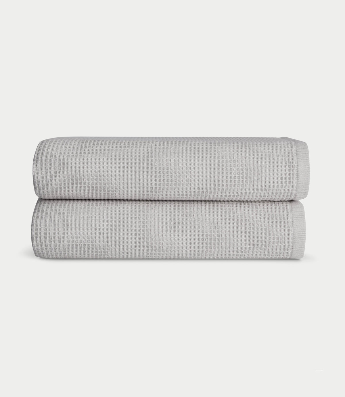 Waffle Bath towels in the color light grey. Photo of light grey Waffle Bath towels taken with white background. |Color:Light Grey