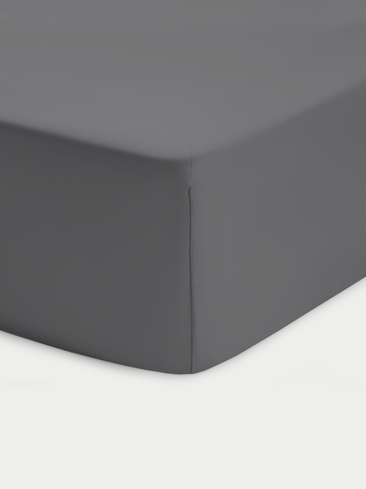 Corner of charcoal crib sheet with white background 