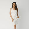 Person wearing a Cozy Earth Brushed Bamboo Patch Pocket Skirt in white on a white background |Color:Ivory
