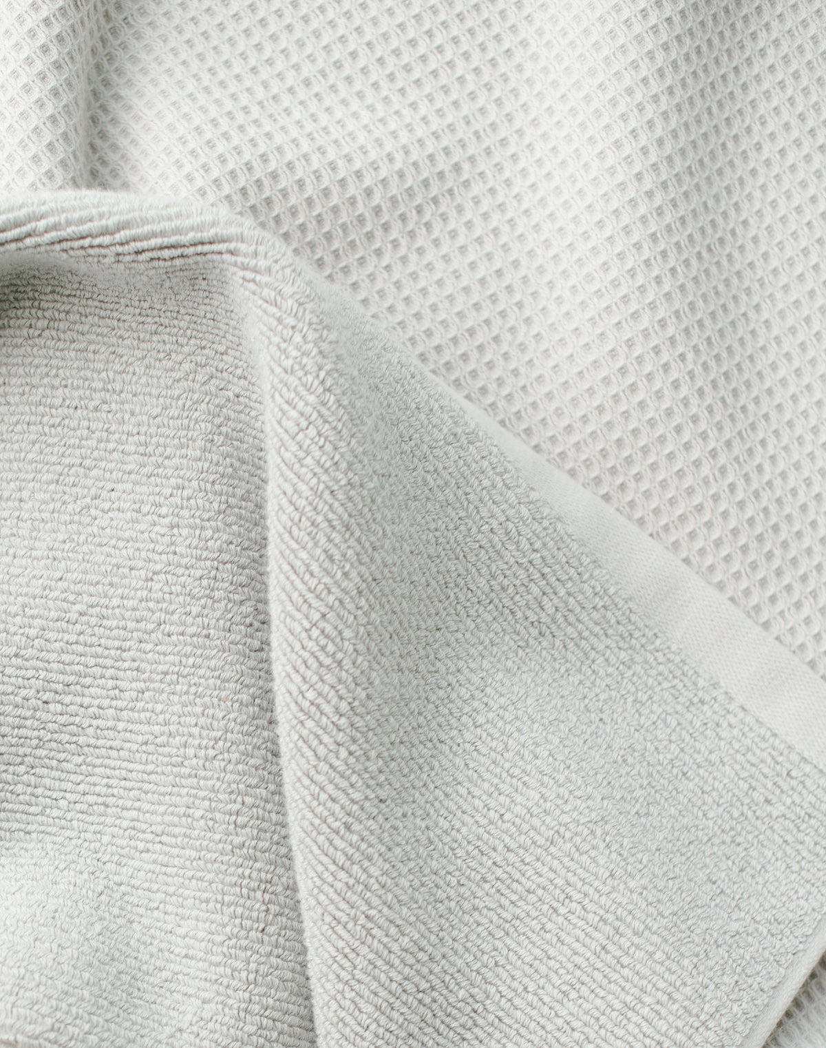 Waffle Bath Towel in the color Harbor Mist. Photo of Harbor Mist Waffle Bath Towel taken as a close up of the Waffle Bath Towel. The picture shows only the towel 
