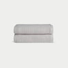 Light Grey Waffle Hand Towel set neatly folded. The photo was taken with a white background. |Color:Light Grey